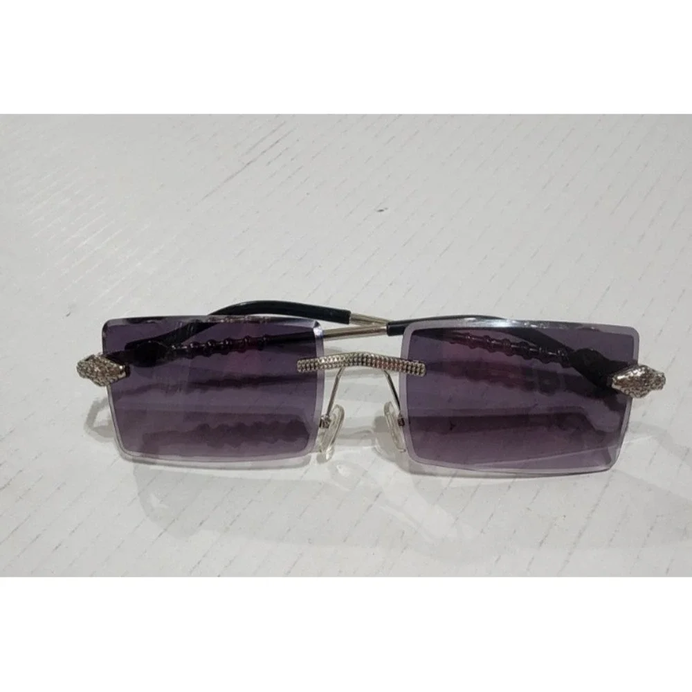 Womens silver snake embellished rimless fashionable sunglasses uv protection